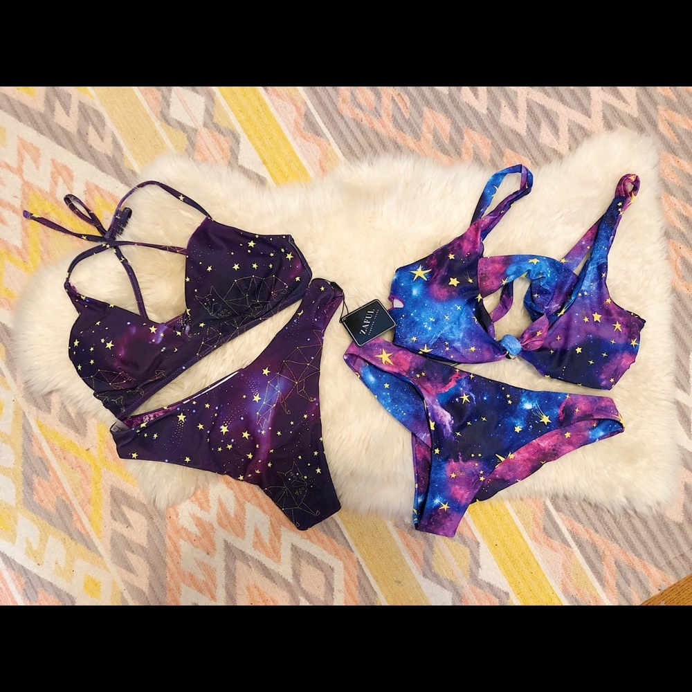 Set of two galaxy star swimsuits NWT